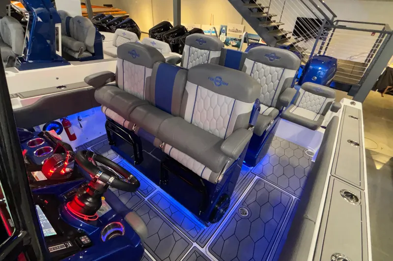  Yacht Photos Pics 2022 Fountain 38 SC boat interior with modern seating and illuminated controls.