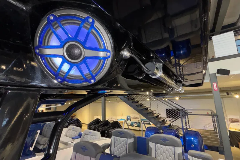  Yacht Photos Pics Interior of 2022 Fountain 38 SC boat with blue speaker and luxury seating.