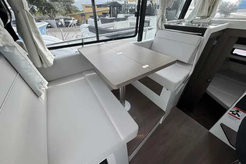  Yacht Photos Pics Interior of 2026 Jeanneau NC 895 Sport Series 2, featuring a modern dining area.