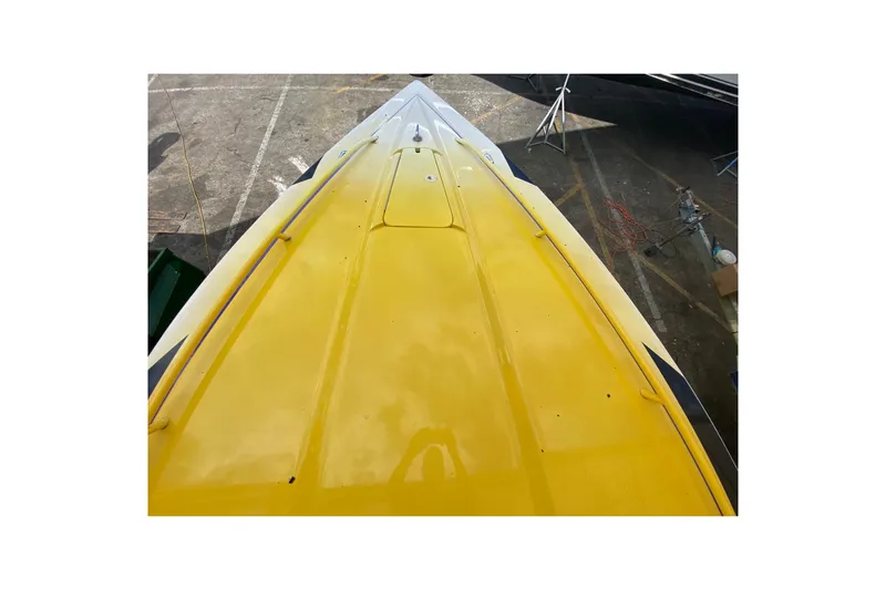  Yacht Photos Pics Yellow 1999 Fountain 47 Lightning boat deck, viewed from above.