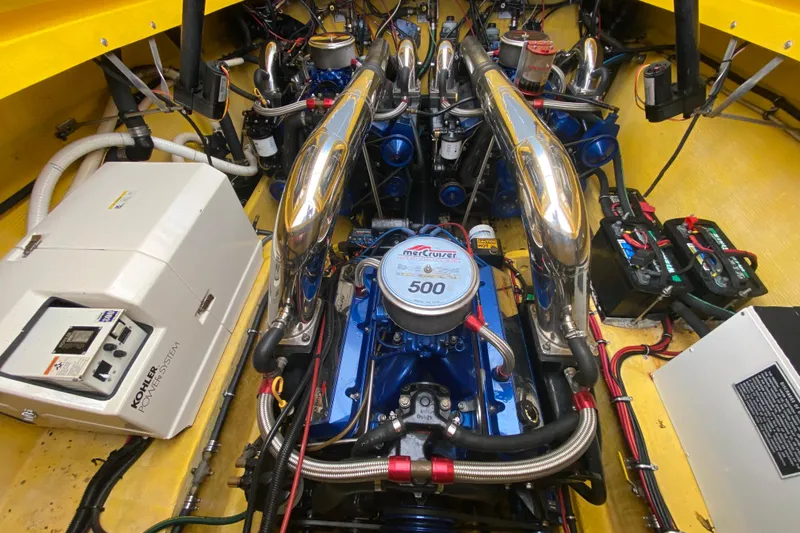  Yacht Photos Pics Engine compartment of a 1999 Fountain 47 Lightning boat with MerCruiser 500 engine.