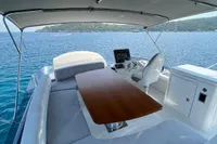Luxurious 2017 Azimut Magellano 53 yacht interior with elegant seating and ocean view.