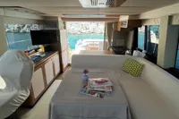 Interior of 2017 Azimut Magellano 53 yacht with elegant seating and sea view.