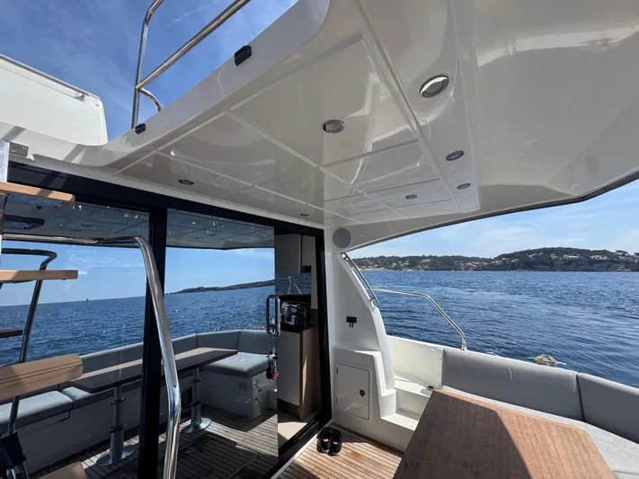  Yacht Photos Pics 2023 Prestige 460 yacht interior with ocean view, featuring sleek design and modern amenities.