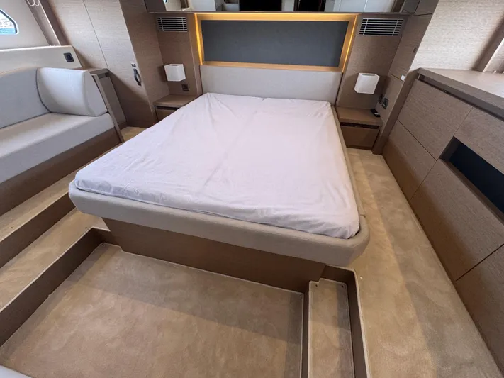  Yacht Photos Pics Luxurious interior of 2023 Prestige 460 yacht with modern bed and elegant design.