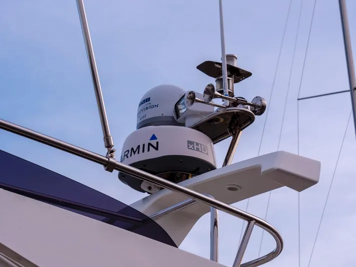 Seahawk Yacht Photos Pics Radar equipment on 2017 Nimbus 405 Flybridge yacht against a clear sky.