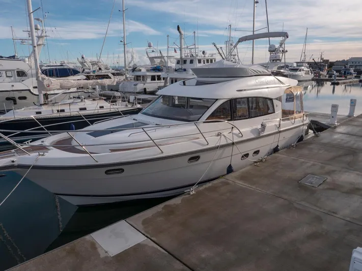 Seahawk Yacht Photos Pics Nimbus 405 Flybridge 2017 yacht docked in marina, surrounded by other boats.