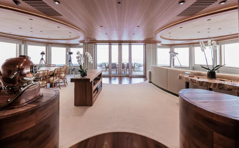 Luna Yacht Photos Pics Luxurious yacht interior with wooden accents, elegant decor, and panoramic windows, Custom Lloyd Werft 2010.