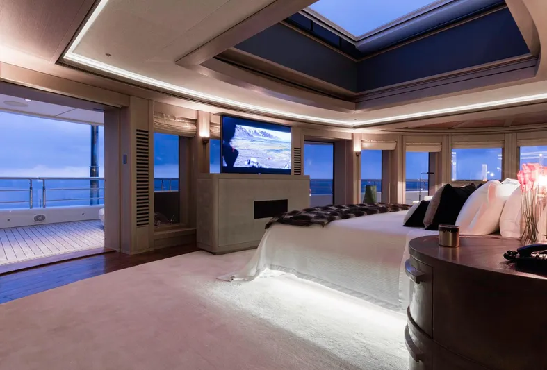 Luna Yacht Photos Pics Luxurious yacht bedroom with ocean view, featuring modern decor and ambient lighting, Custom Lloyd Werft 2010.