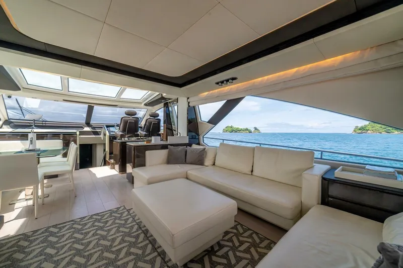 Carpe Diem Yacht Photos Pics Luxurious interior of 2017 Azimut 77S yacht with ocean view and elegant seating.