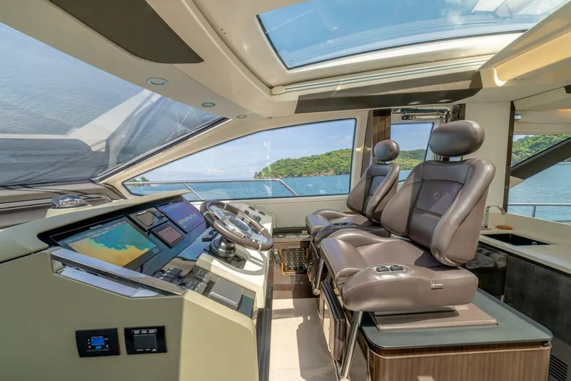 Carpe Diem Yacht Photos Pics Luxurious 2017 Azimut 77S yacht cockpit with leather seats and advanced navigation systems.