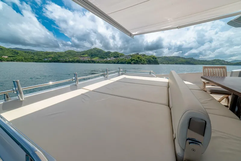 Carpe Diem Yacht Photos Pics Luxurious Azimut 77S yacht deck with scenic ocean and mountain views, 2017 model.