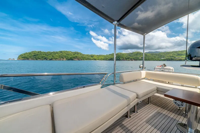 Carpe Diem Yacht Photos Pics Luxurious 2017 Azimut 77S yacht deck with scenic ocean and island view.