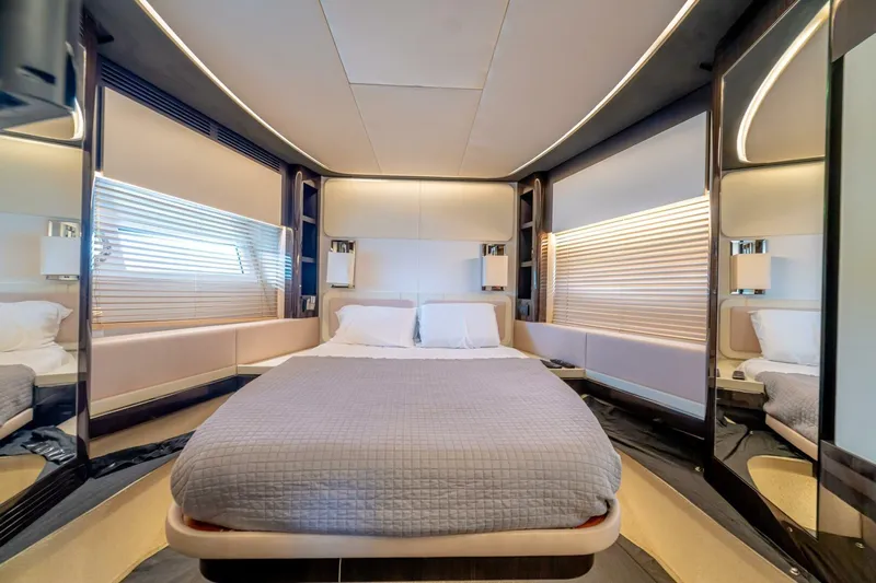 Carpe Diem Yacht Photos Pics Luxurious bedroom interior of 2017 Azimut 77S yacht with modern design and ambient lighting.