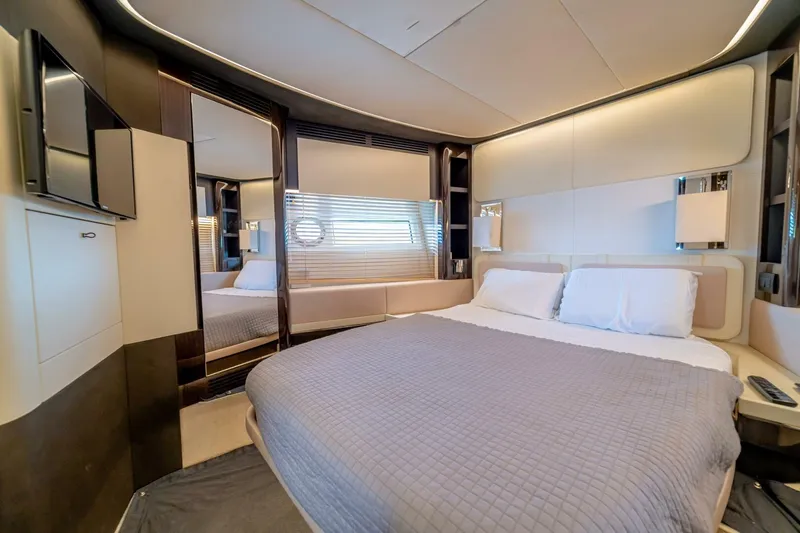 Carpe Diem Yacht Photos Pics Luxurious bedroom interior of 2017 Azimut 77S yacht with modern design and cozy bedding.