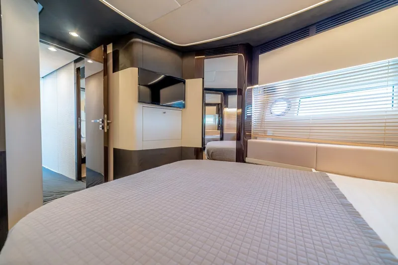 Carpe Diem Yacht Photos Pics Luxurious interior of 2017 Azimut 77S yacht bedroom with modern design and elegant furnishings.
