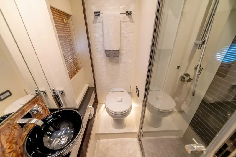 Carpe Diem Yacht Photos Pics Luxurious 2017 Azimut 77S yacht bathroom with modern fixtures and elegant design.