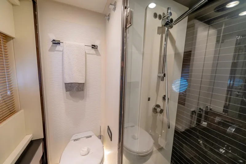 Carpe Diem Yacht Photos Pics Luxurious bathroom in 2017 Azimut 77S yacht with modern shower and toilet.