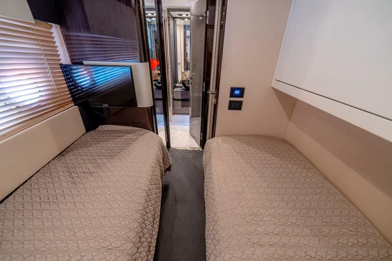 Carpe Diem Yacht Photos Pics Luxurious twin cabin interior of 2017 Azimut 77S yacht with modern decor.