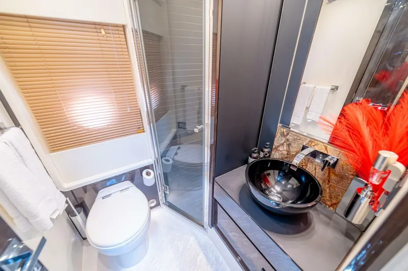 Carpe Diem Yacht Photos Pics Luxurious 2017 Azimut 77S yacht bathroom with modern fixtures and elegant design.
