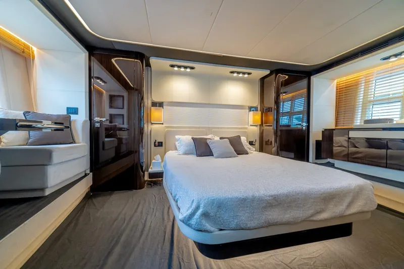 Carpe Diem Yacht Photos Pics Luxurious bedroom interior of 2017 Azimut 77S yacht with modern design and ambient lighting.