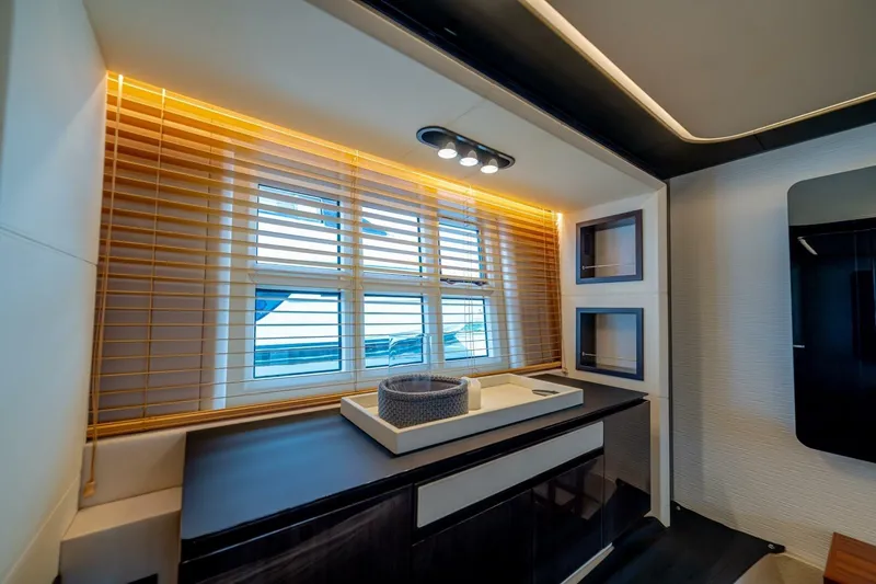 Carpe Diem Yacht Photos Pics Luxurious interior of 2017 Azimut 77S yacht with modern design and ambient lighting.