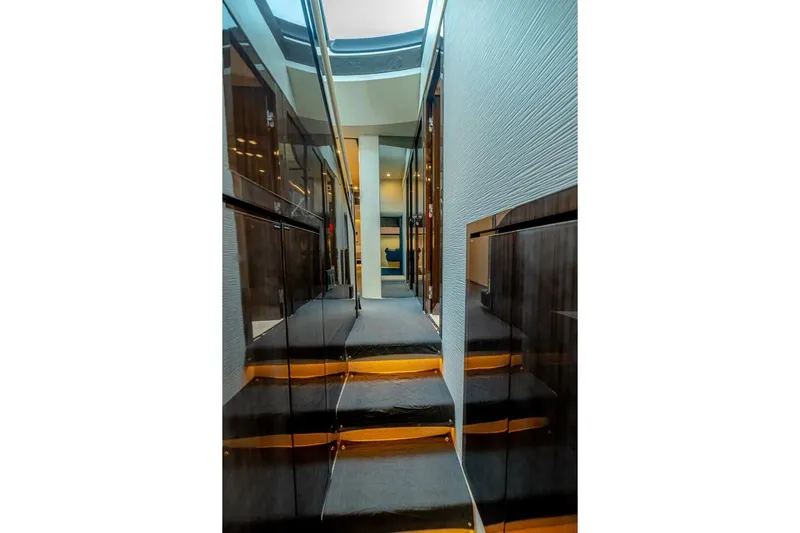 Carpe Diem Yacht Photos Pics Interior hallway of 2017 Azimut 77S yacht with modern design and sleek finishes.
