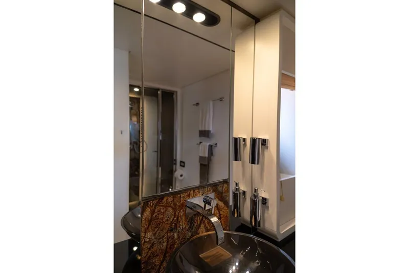 Carpe Diem Yacht Photos Pics Luxurious bathroom interior of 2017 Azimut 77S yacht with modern fixtures and elegant design.