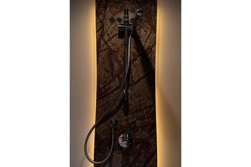 Carpe Diem Yacht Photos Pics Luxurious shower fixture on Azimut 77S yacht, 2017 model, with elegant lighting.