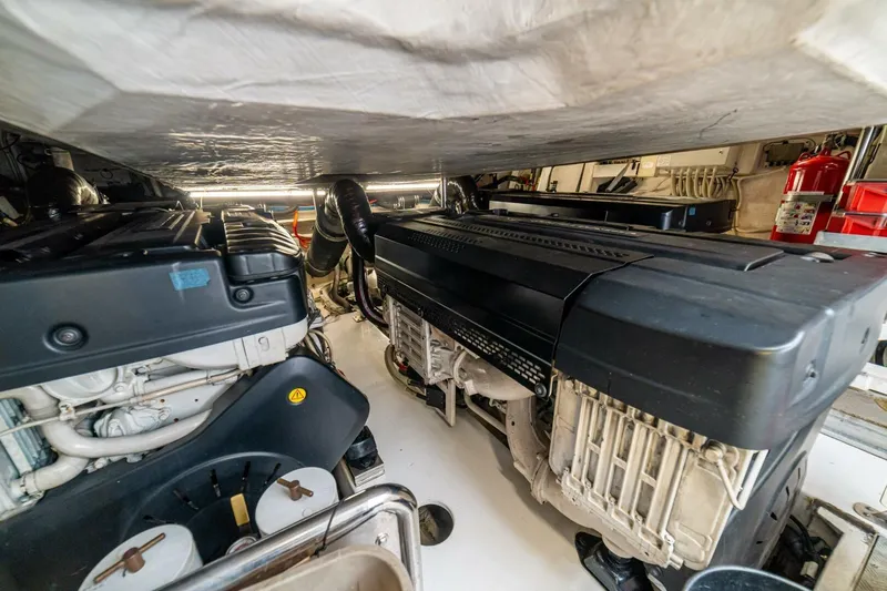 Carpe Diem Yacht Photos Pics Engine room of a 2017 Azimut 77S yacht, showcasing powerful machinery and equipment.