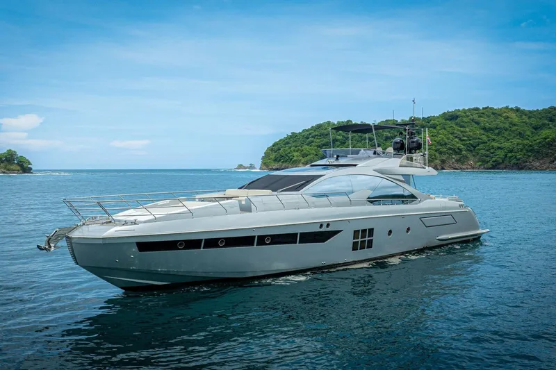 Carpe Diem Yacht Photos Pics Luxury 2017 Azimut 77S yacht cruising in scenic coastal waters.