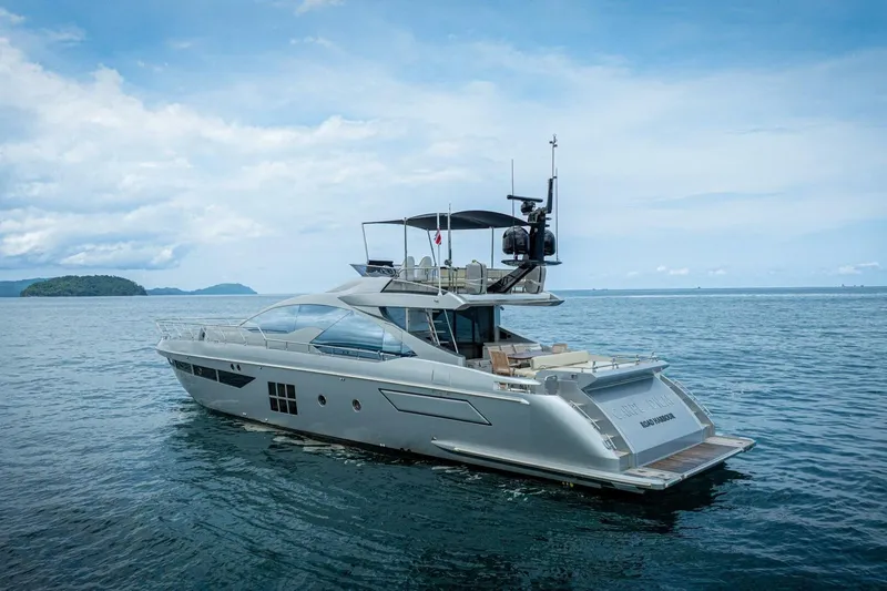 Carpe Diem Yacht Photos Pics Luxurious 2017 Azimut 77S yacht cruising on serene ocean waters.