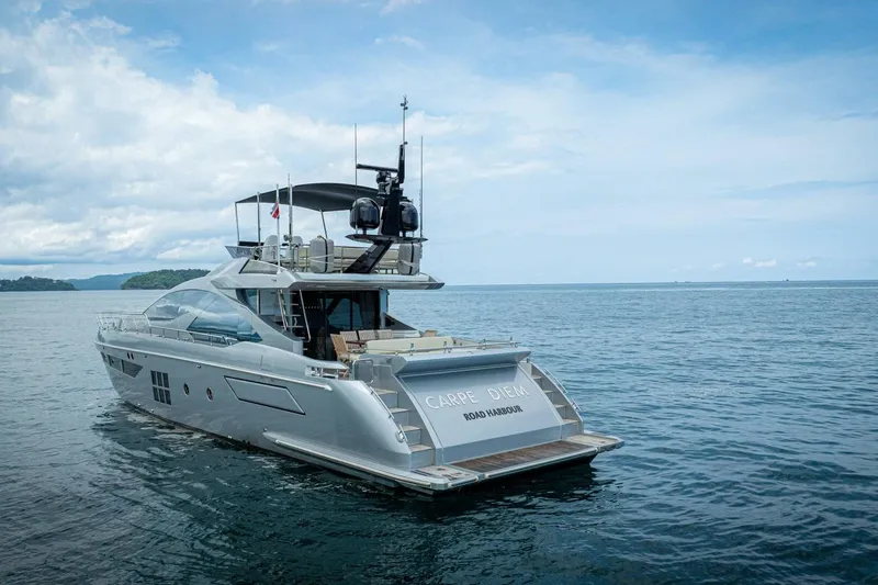 Carpe Diem Yacht Photos Pics Azimut 77S 2017 luxury yacht on open sea, clear sky, rear view.