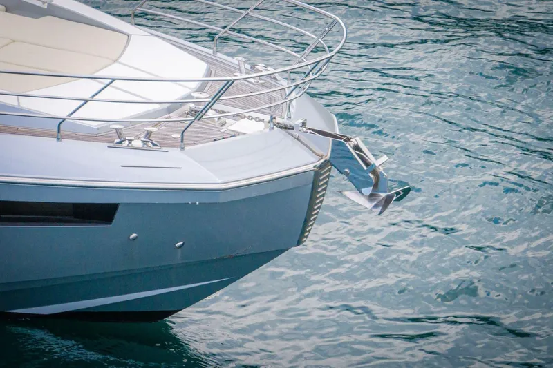 Carpe Diem Yacht Photos Pics 2017 Azimut 77S yacht bow with anchor in calm water.