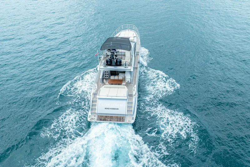 Carpe Diem Yacht Photos Pics Azimut 77S yacht cruising on open water, aerial view, 2017 model.