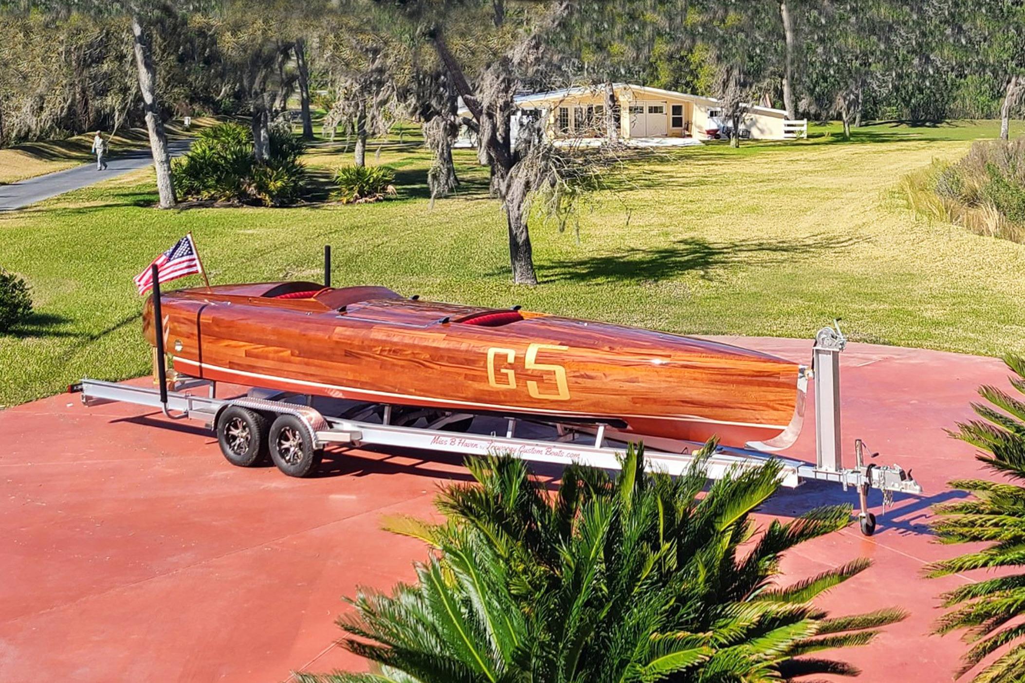 Custom 2024 Treworgy Replica of 30’ Baby Bootlegger on trailer, displayed outdoors.