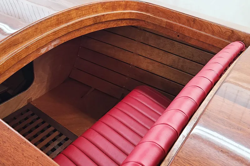  Yacht Photos Pics Interior of 2024 Treworgy Replica Baby Bootlegger with red leather seating and wooden finish.