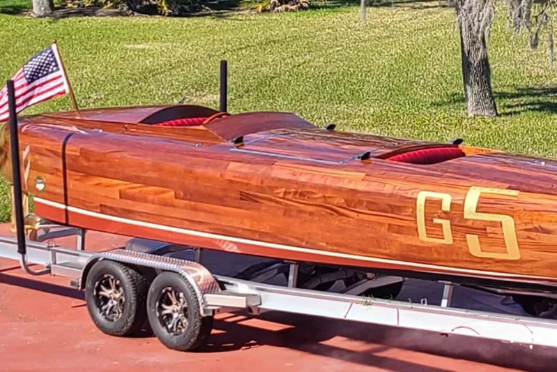  Yacht Photos Pics Custom 2024 Treworgy Replica of 30’ Baby Bootlegger on trailer with American flag.