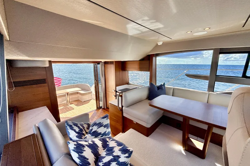  Yacht Photos Pics Luxurious interior of 2026 Princess F50 yacht with ocean view and elegant seating.