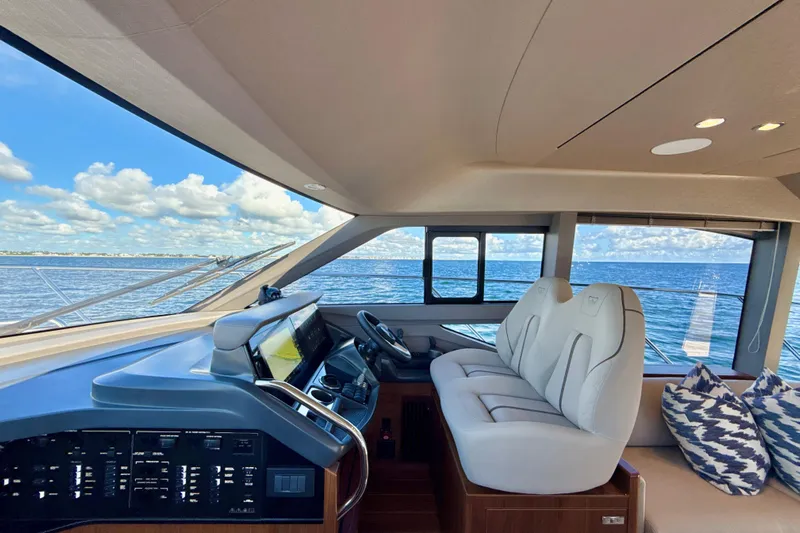  Yacht Photos Pics Luxurious interior of 2026 Princess F50 yacht with ocean view and plush seating.