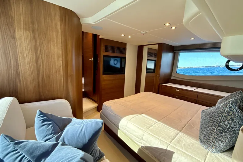  Yacht Photos Pics Luxurious 2026 Princess F50 yacht interior with elegant wood finishes and ocean view.