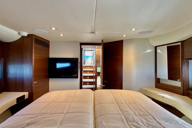  Yacht Photos Pics Luxurious interior of 2026 Princess F50 yacht with modern bedroom design.