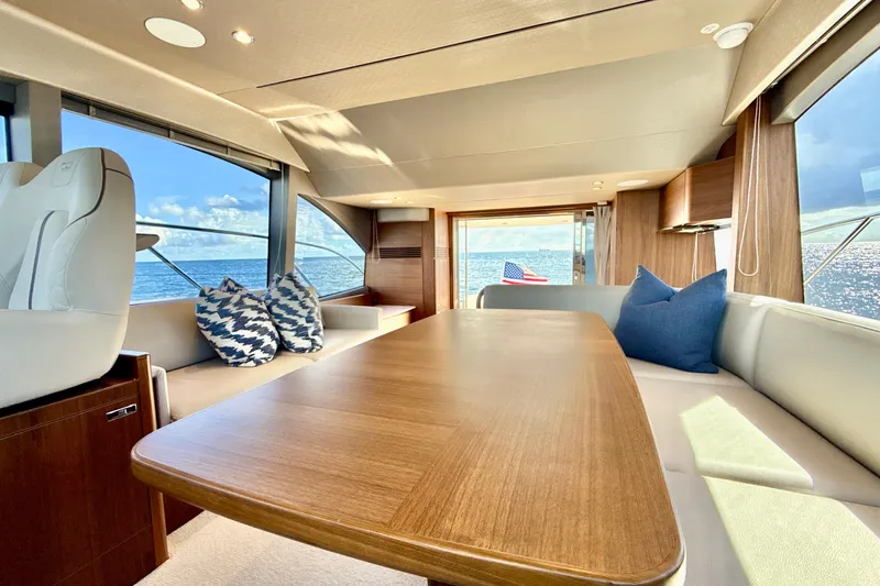  Yacht Photos Pics Luxurious interior of 2026 Princess F50 yacht with ocean view and elegant seating.