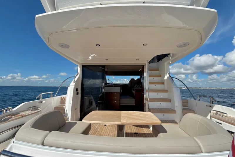  Yacht Photos Pics Luxurious 2026 Princess F50 yacht with elegant seating and ocean view.