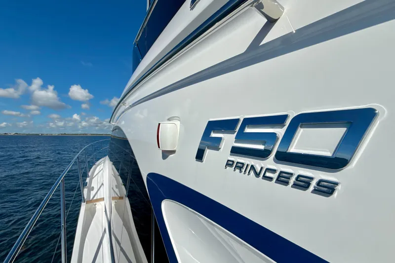  Yacht Photos Pics 2026 Princess F50 yacht on open water, showcasing sleek design and branding.