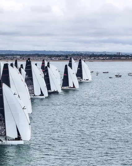 Zen - Formerly Synergy, Sorcha Yacht Photos Pics Sailboats racing on the water, Botin TP 52, 2011 model, overcast sky.