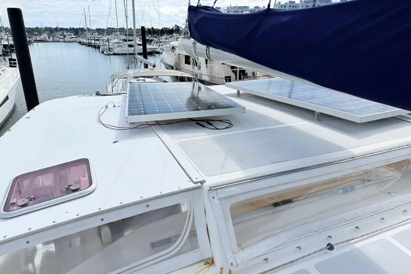 Orbit Yacht Photos Pics 2011 Royal Cape Catamarans Majestic 53 with solar panels docked at marina.
