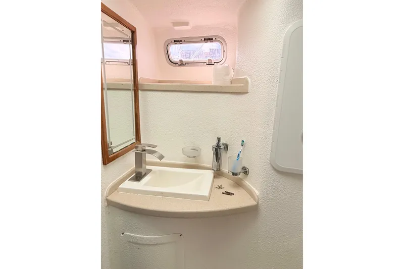 Orbit Yacht Photos Pics Compact bathroom sink area in 2011 Royal Cape Catamarans Majestic 53 yacht.