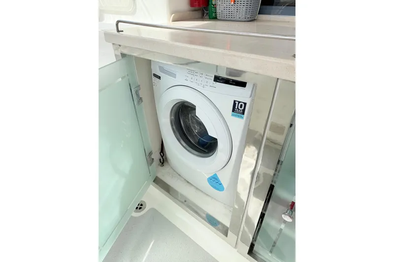 Orbit Yacht Photos Pics Washing machine in a 2011 Royal Cape Catamarans Majestic 53 yacht interior.