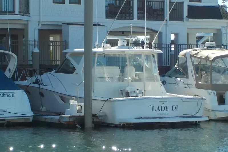 "lady Di" Yacht Photos Pics 2009 Tiara Yachts 3900 Open docked, named "Lady Di," in a marina setting.